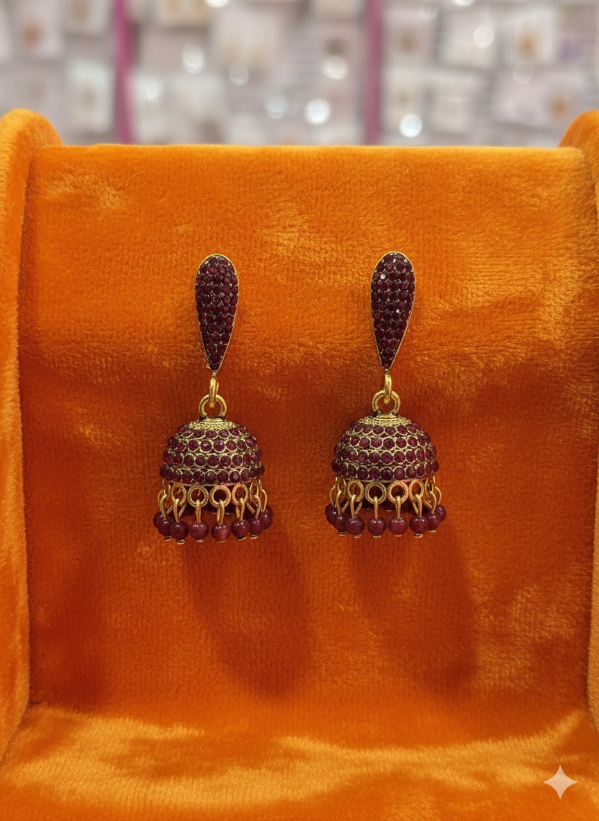 traditional Jhumka earrings with a modern twist.