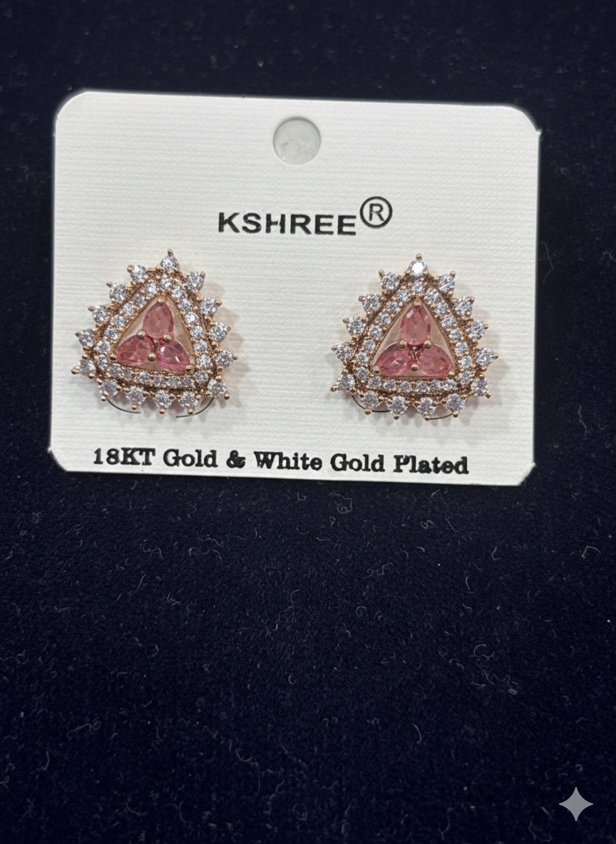 triangle-shaped earrings with pink center stones surrounded by small white stones