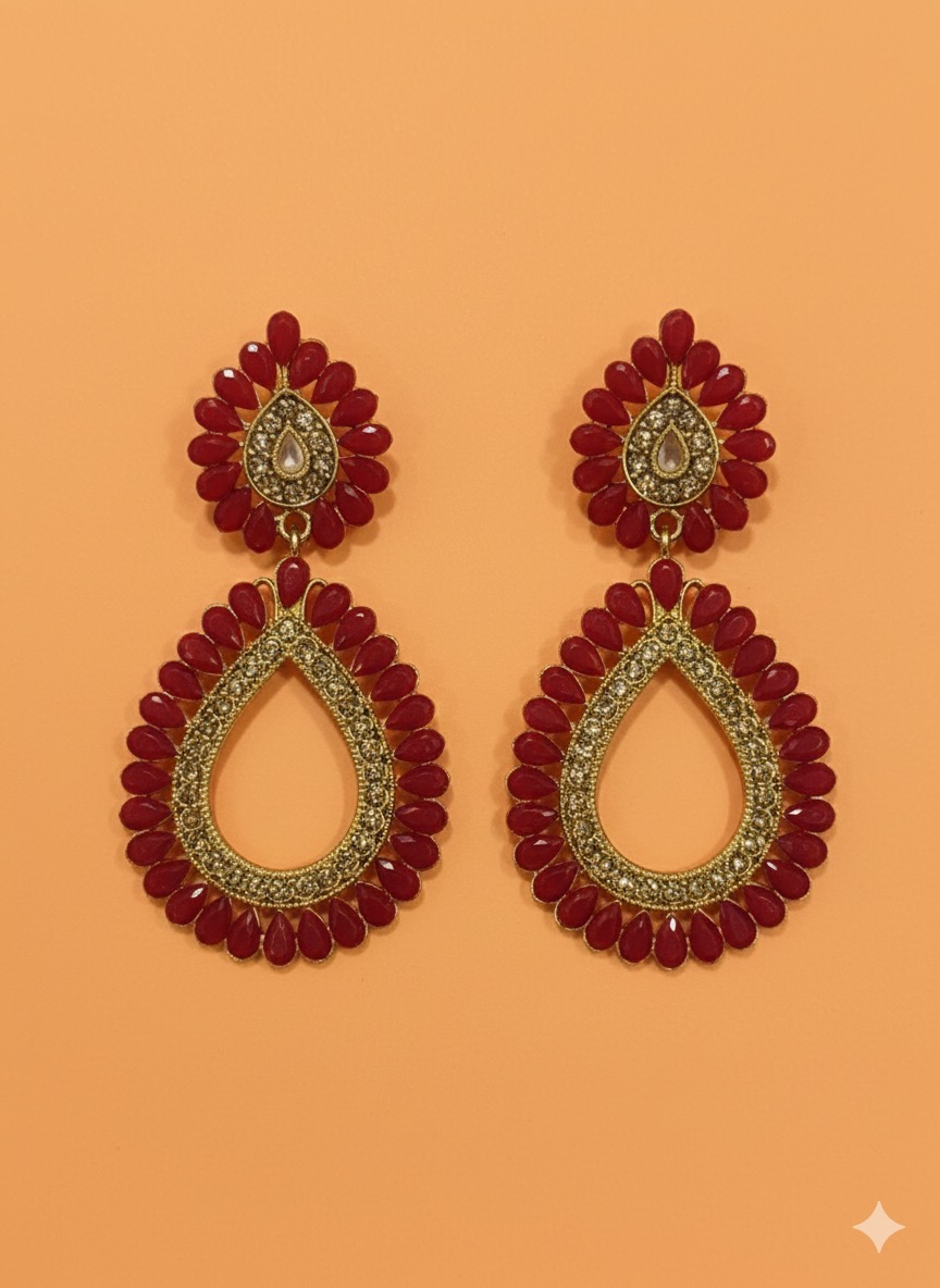 The deep red stones paired with the golden setting